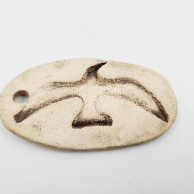 FUN BONE BIRD PENDANT