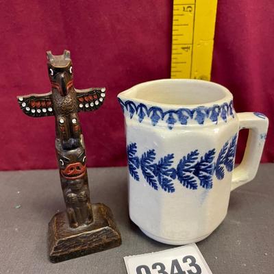 Collectible small pitcher/totem pole