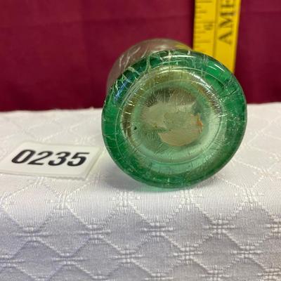 Green glass perfume bottle