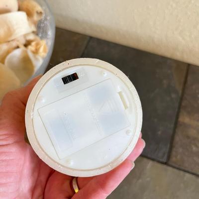 Bowl of sea shells & candles