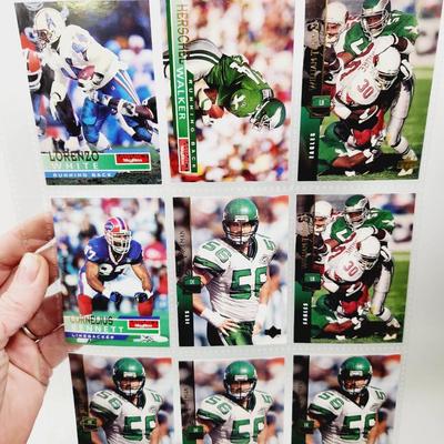 234 COLLECTABLE FOOTBALL CARDS IN PROTECTIVE SLEEVES - ROOKIES INCLUDED
