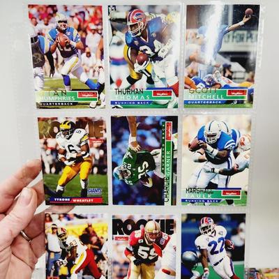 234 COLLECTABLE FOOTBALL CARDS IN PROTECTIVE SLEEVES - ROOKIES INCLUDED