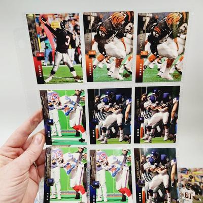 234 COLLECTABLE FOOTBALL CARDS IN PROTECTIVE SLEEVES - ROOKIES INCLUDED