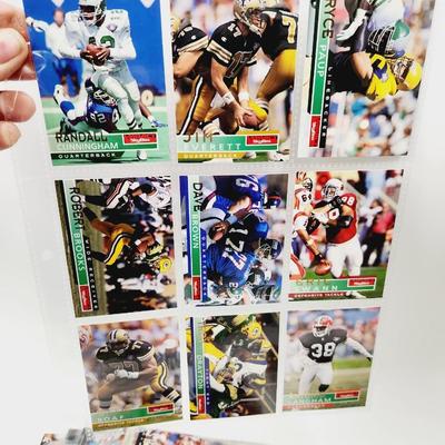 234 COLLECTABLE FOOTBALL CARDS IN PROTECTIVE SLEEVES - ROOKIES INCLUDED
