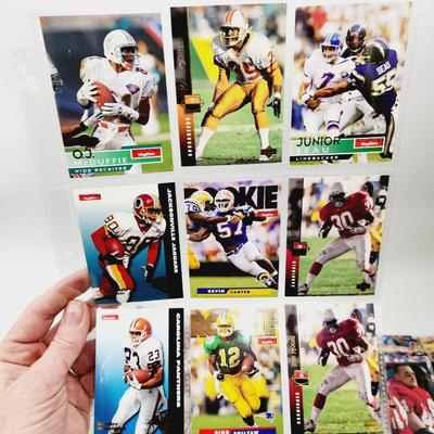 234 COLLECTABLE FOOTBALL CARDS IN PROTECTIVE SLEEVES - ROOKIES INCLUDED