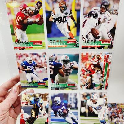 234 COLLECTABLE FOOTBALL CARDS IN PROTECTIVE SLEEVES - ROOKIES INCLUDED