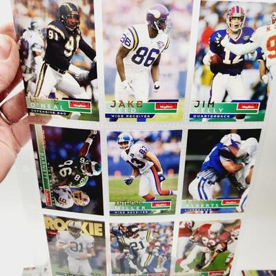 234 COLLECTABLE FOOTBALL CARDS IN PROTECTIVE SLEEVES - ROOKIES INCLUDED