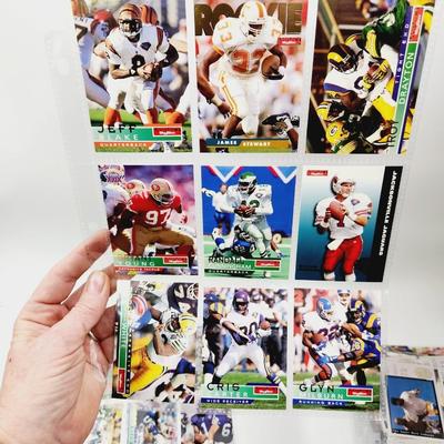 234 COLLECTABLE FOOTBALL CARDS IN PROTECTIVE SLEEVES - ROOKIES INCLUDED