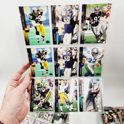 234 COLLECTABLE FOOTBALL CARDS IN PROTECTIVE SLEEVES - ROOKIES INCLUDED