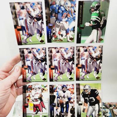 234 COLLECTABLE FOOTBALL CARDS IN PROTECTIVE SLEEVES - ROOKIES INCLUDED