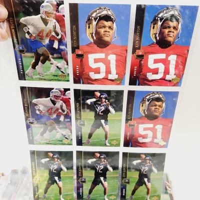 234 COLLECTABLE FOOTBALL CARDS IN PROTECTIVE SLEEVES - ROOKIES INCLUDED