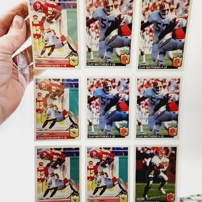 219 COLLECTABLE FOOTBALL CARDS IN PROTECTIVE SLEEVES