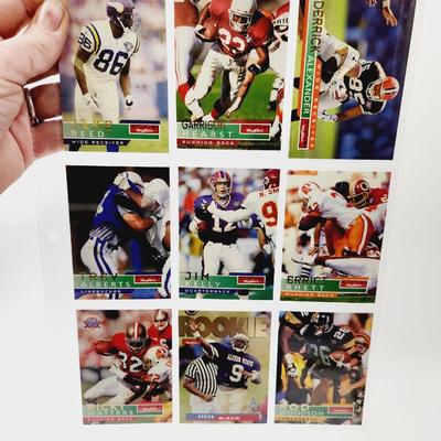 219 COLLECTABLE FOOTBALL CARDS IN PROTECTIVE SLEEVES