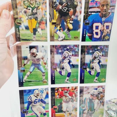 219 COLLECTABLE FOOTBALL CARDS IN PROTECTIVE SLEEVES