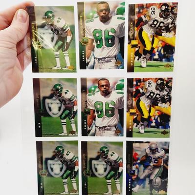 219 COLLECTABLE FOOTBALL CARDS IN PROTECTIVE SLEEVES
