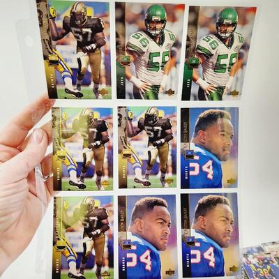 219 COLLECTABLE FOOTBALL CARDS IN PROTECTIVE SLEEVES