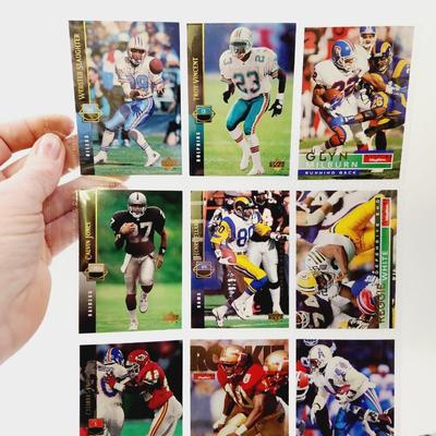 219 COLLECTABLE FOOTBALL CARDS IN PROTECTIVE SLEEVES
