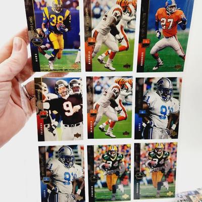 219 COLLECTABLE FOOTBALL CARDS IN PROTECTIVE SLEEVES