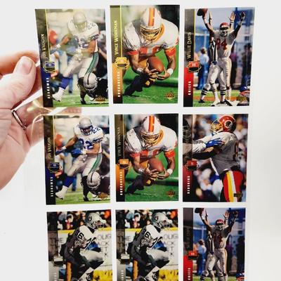 219 COLLECTABLE FOOTBALL CARDS IN PROTECTIVE SLEEVES