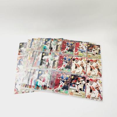 153 COLLECTABLE FOOTBALL CARDS IN PROTECTIVE SLEEVES
