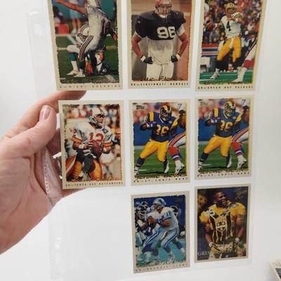 219 COLLECTABLE FOOTBALL CARDS IN PROTECTIVE SLEEVES