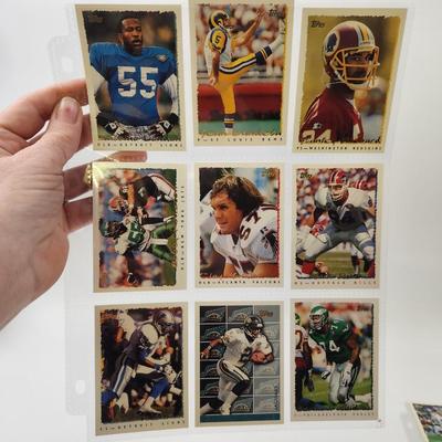 219 COLLECTABLE FOOTBALL CARDS IN PROTECTIVE SLEEVES