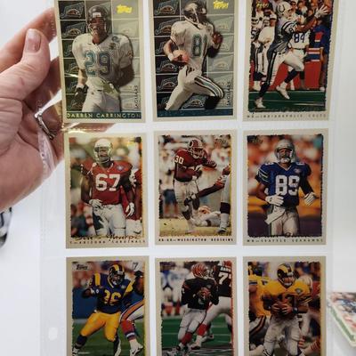 219 COLLECTABLE FOOTBALL CARDS IN PROTECTIVE SLEEVES