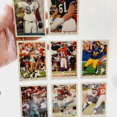 225 COLLECTABLE FOOTBALL CARDS W/ PROTECTIVE SLEEVES