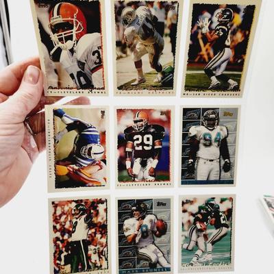 225 COLLECTABLE FOOTBALL CARDS W/ PROTECTIVE SLEEVES