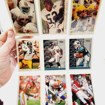 225 COLLECTABLE FOOTBALL CARDS W/ PROTECTIVE SLEEVES