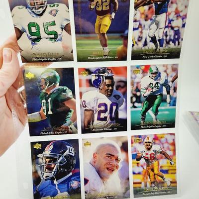 225 COLLECTABLE FOOTBALL CARDS W/ PROTECTIVE SLEEVES