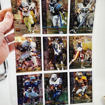 225 COLLECTABLE FOOTBALL CARDS W/ PROTECTIVE SLEEVES