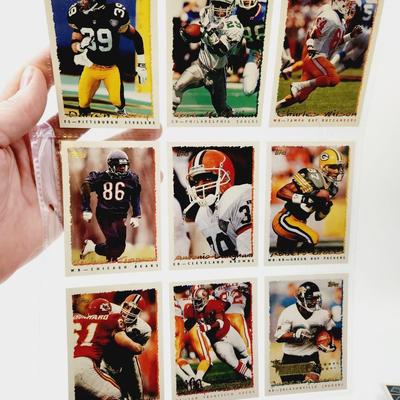 225 COLLECTABLE FOOTBALL CARDS W/ PROTECTIVE SLEEVES