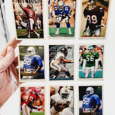 225 COLLECTABLE FOOTBALL CARDS W/ PROTECTIVE SLEEVES