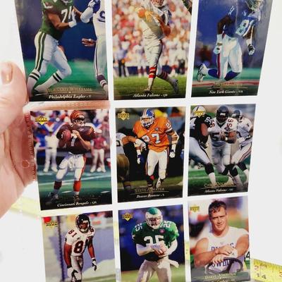 225 COLLECTABLE FOOTBALL CARDS W/ PROTECTIVE SLEEVES