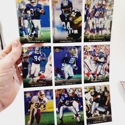 225 COLLECTABLE FOOTBALL CARDS W/ PROTECTIVE SLEEVES