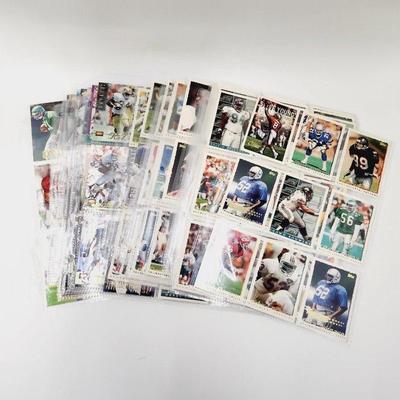 225 COLLECTABLE FOOTBALL CARDS W/ PROTECTIVE SLEEVES