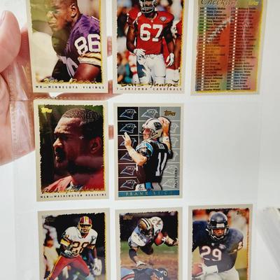 225 COLLECTABLE FOOTBALL CARDS W/ PROTECTIVE SLEEVES
