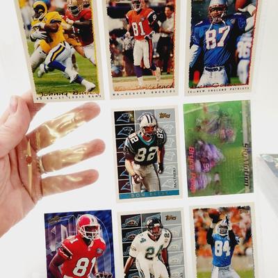 225 COLLECTABLE FOOTBALL CARDS W/ PROTECTIVE SLEEVES