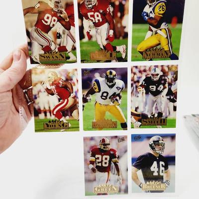 224 COLLECTABLE FOOTBALL CARDS W/ PROTECTIVE SLEEVES