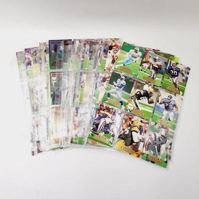 224 COLLECTABLE FOOTBALL CARDS W/ PROTECTIVE SLEEVES