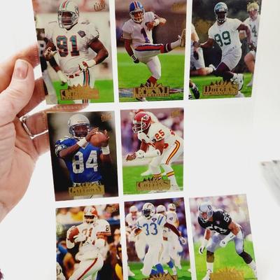 224 COLLECTABLE FOOTBALL CARDS W/ PROTECTIVE SLEEVES