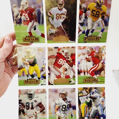 224 COLLECTABLE FOOTBALL CARDS W/ PROTECTIVE SLEEVES
