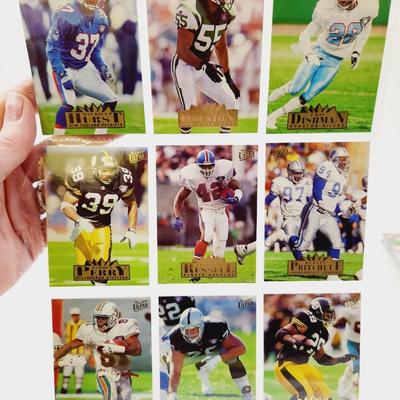 224 COLLECTABLE FOOTBALL CARDS W/ PROTECTIVE SLEEVES