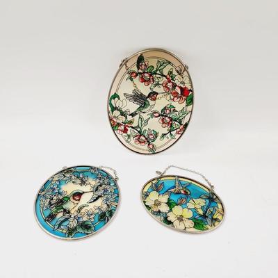 COLLECTION OF GLASS HUMMINGBIRD SUNCATCHERS