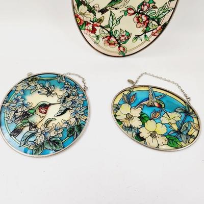 COLLECTION OF GLASS HUMMINGBIRD SUNCATCHERS