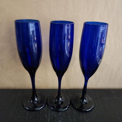 Three  blue galss wine glasses