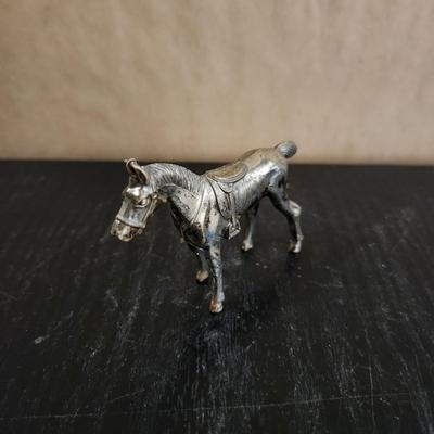 Small silver horse