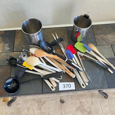 Two jars of kitchen utensils