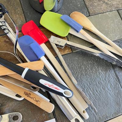 Two jars of kitchen utensils